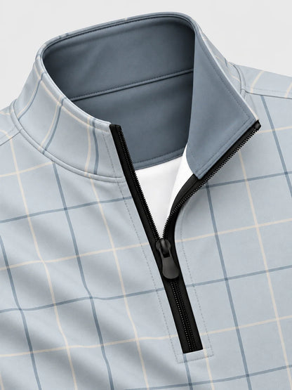 Golfpullover in Puderblau mit Fensterkaromuster und Viertelreißverschluss