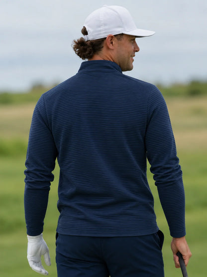 Golf-Pullover aus Funktionsmaterial in tiefem Marineblau mit gerippter Struktur und Viertelreißverschluss