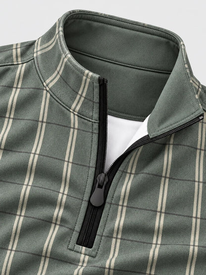 Golf-Pullover aus Funktionsmaterial in Salbeigrün mit Fensterkaromuster und Viertelreißverschluss