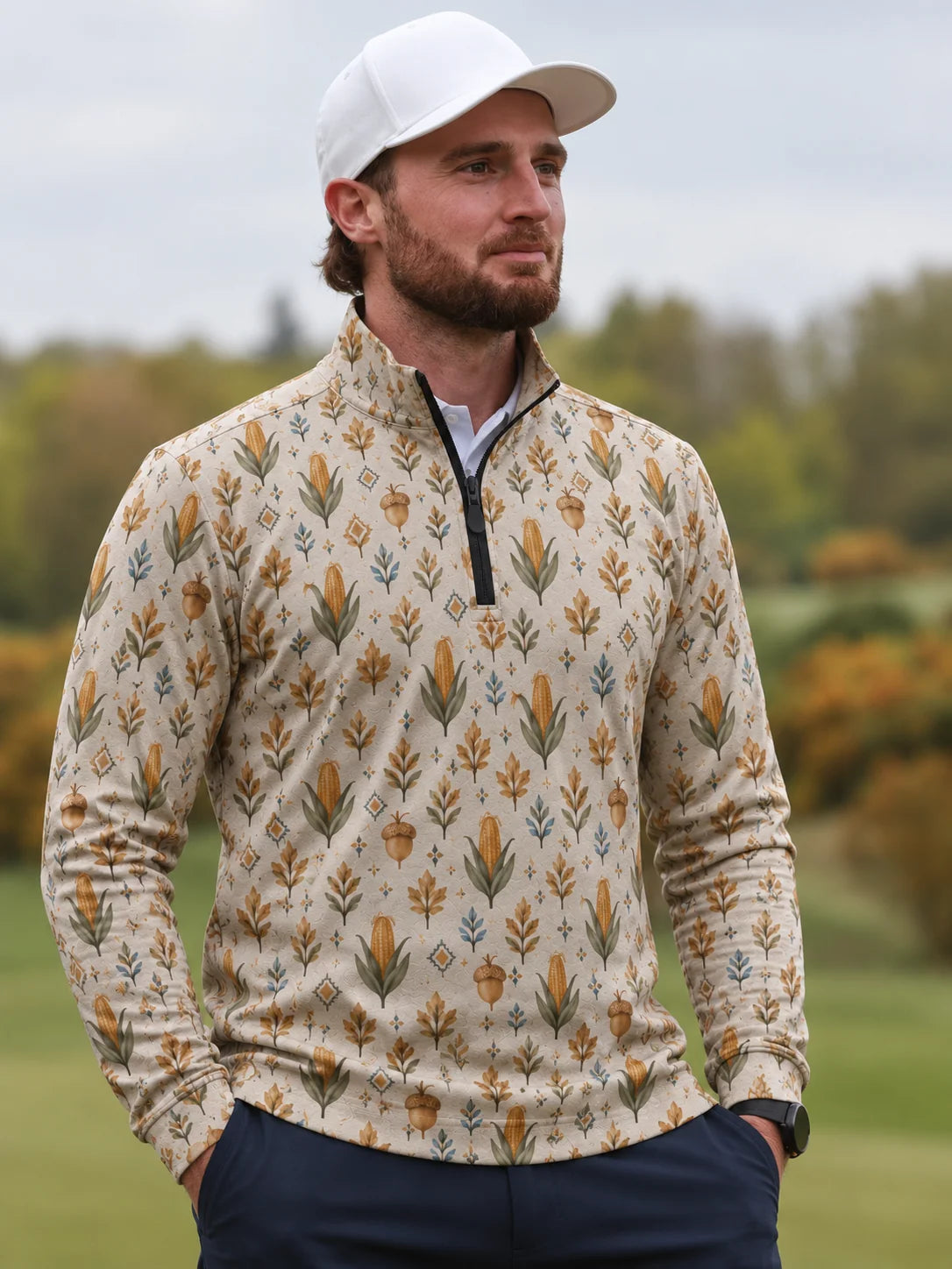 Performance-Golfpullover in Creme mit Erntemotiv und Viertelreißverschluss