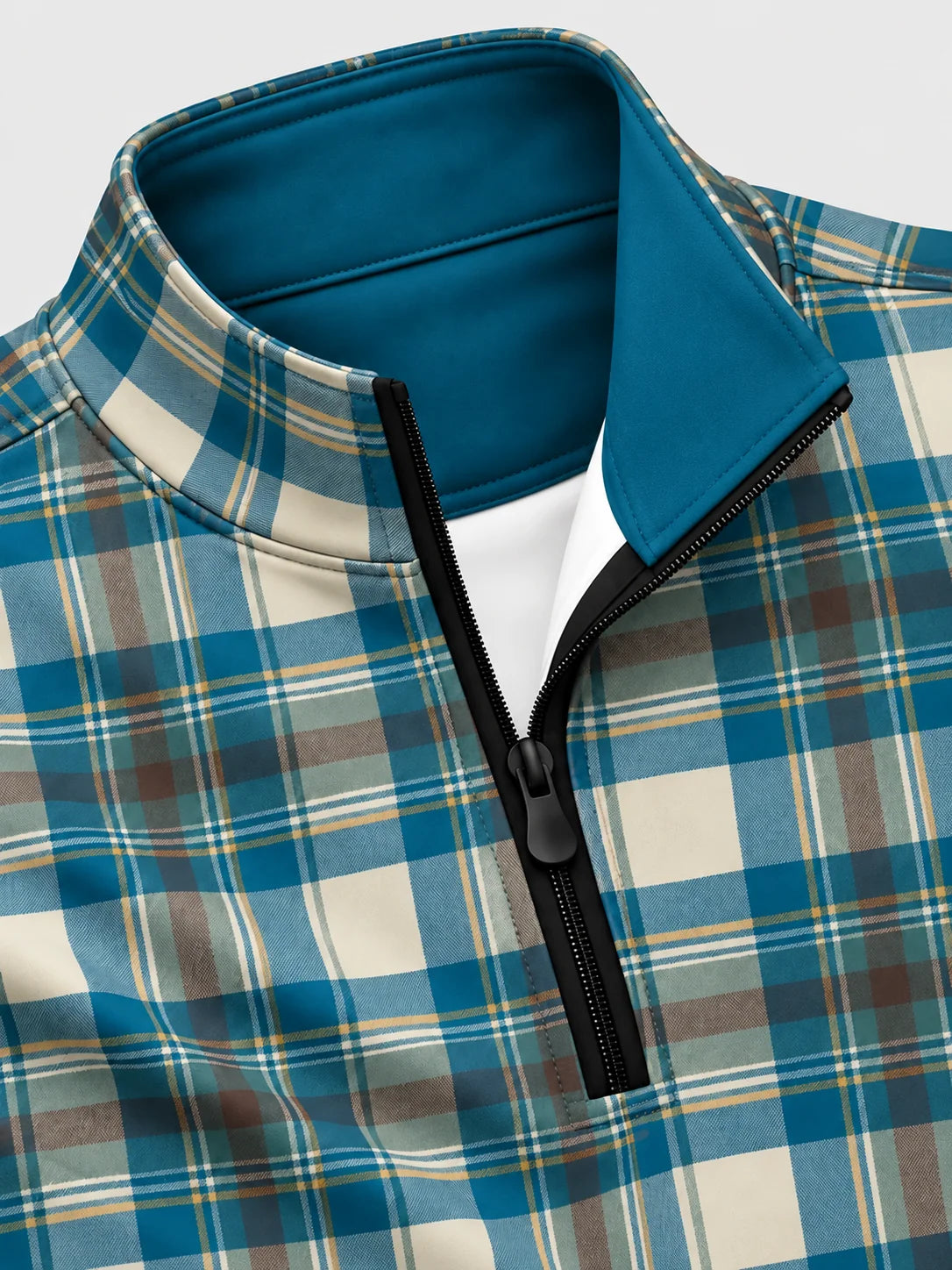 Golfpullover in Petrol und Creme mit Tartanmuster und Viertelreißverschluss