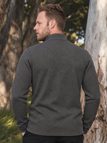 Anthrazitgrauer Golf-Pullover aus Birdseye-Funktionsstrick mit Viertelreißverschluss