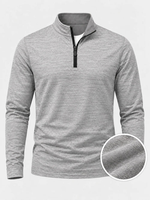 Hellgrauer Golfpullover aus Funktionsmaterial mit strukturierter Oberfläche und kurzem Reißverschluss
