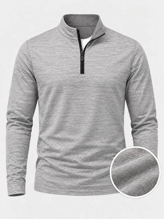 Hellgrauer Golfpullover aus Funktionsmaterial mit strukturierter Oberfläche und kurzem Reißverschluss