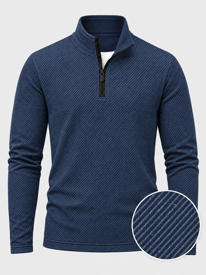 Golf-Pullover mit Viertelreißverschluss und diagonalem Streifenmuster in Marineblau