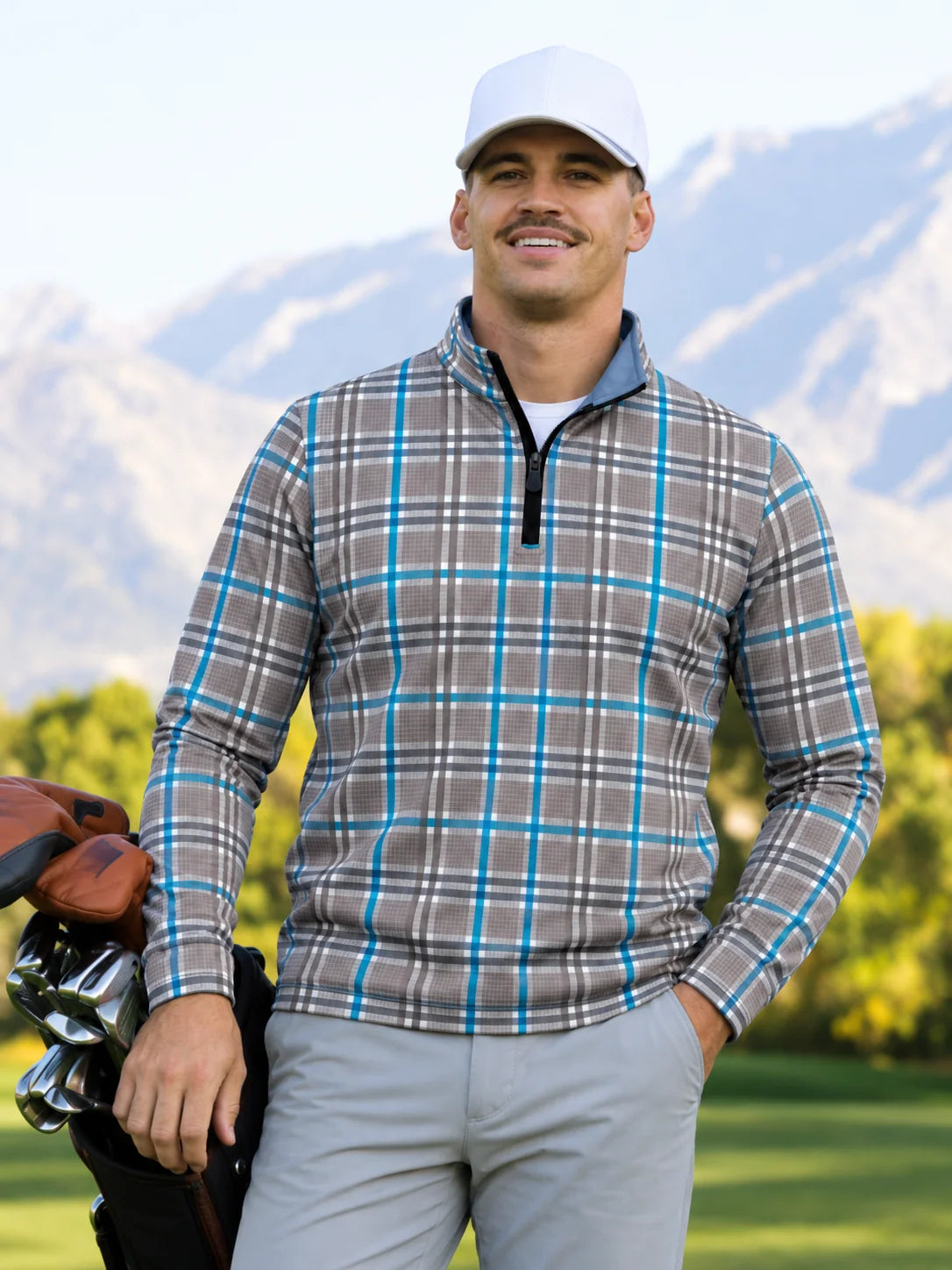Steingrauer Golf-Pullover mit aquafarbenem Karomuster und Viertelreißverschluss aus Funktionsmaterial