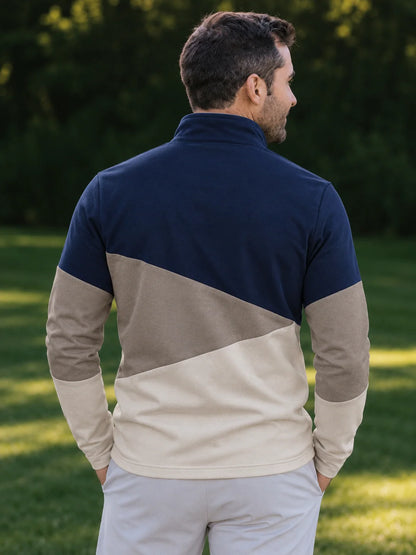 Golfpullover mit Viertelreißverschluss und Colorblock-Design in Marineblau und Taupe, aus Funktionsmaterial