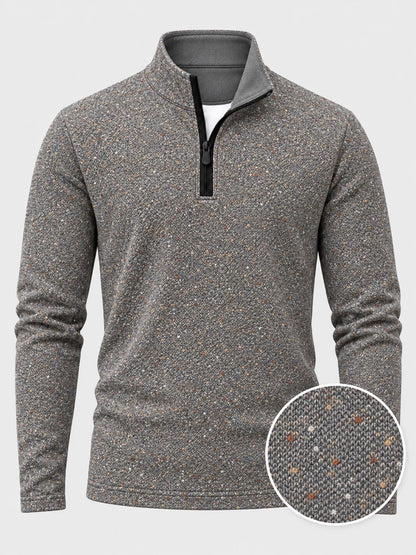 Golf-Pullover mit Viertelreißverschluss und Donegal-Tweed-Muster in meliertem Grau