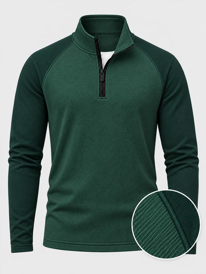 Golf-Pullover aus Funktionsmaterial in Waldgrün mit diagonaler Rippstruktur und Viertelreißverschluss
