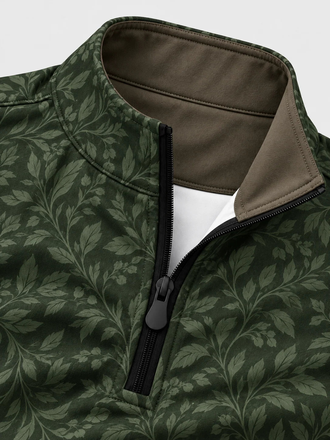 Golfpullover mit botanischem Muster in Dunkelwaldgrün, Funktionsmaterial und Viertelreißverschluss