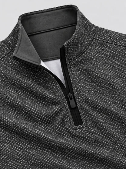 Anthrazitgrauer Golf-Pullover aus Birdseye-Funktionsstrick mit Viertelreißverschluss